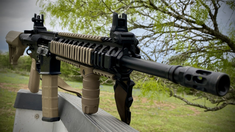 Combat Defender muzzle brake and flip-up sights