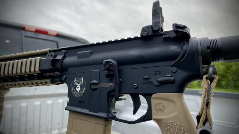 Combat Defender receiver with the Big Mike's Outpost logo