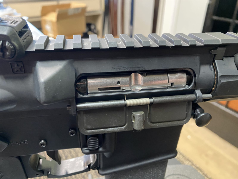 Defender 22 ejection port close-up