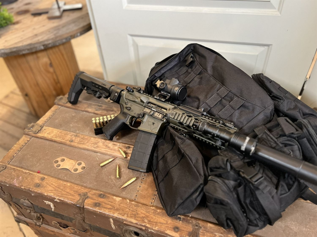 Suppressed AR build with range bag and ammo