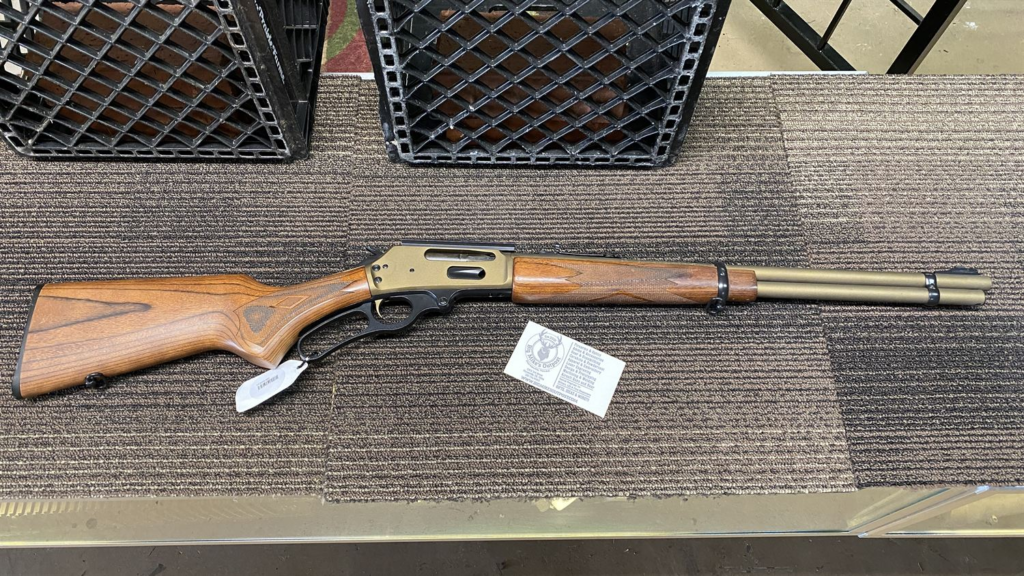 Lever-action rifle with wood stock