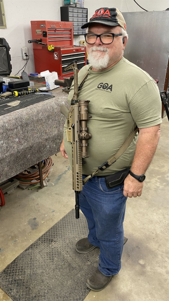 A happy customer with his new build