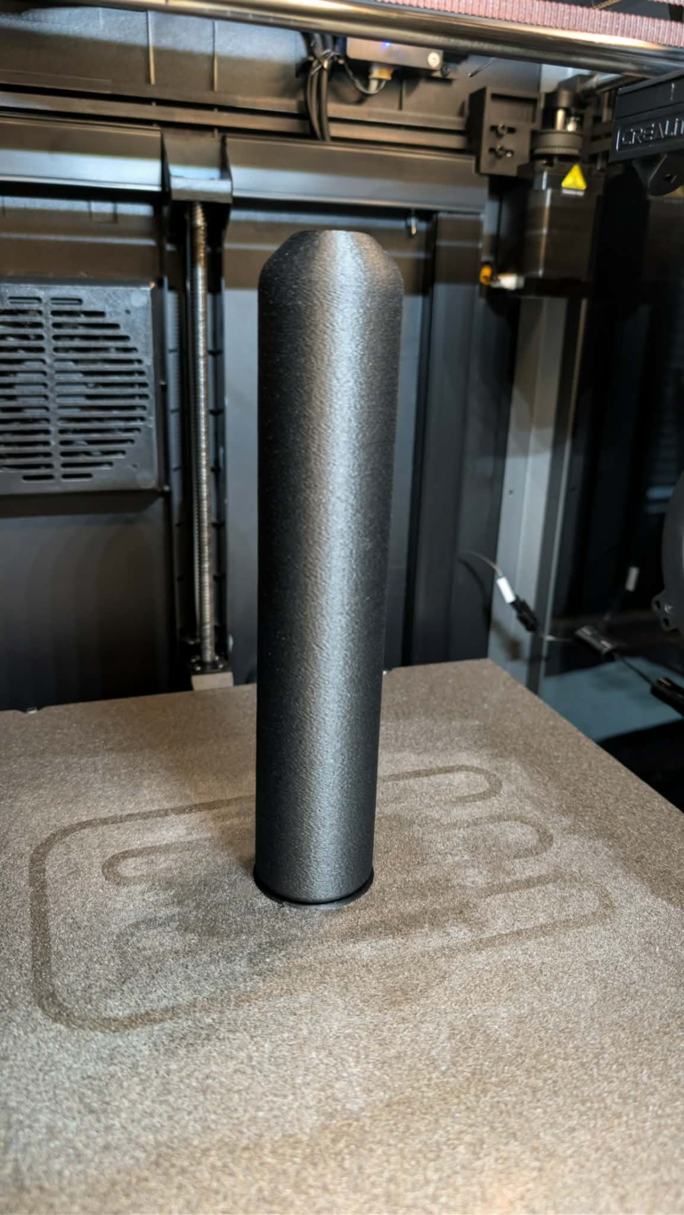 Model 95 9mm suppressor standing upright